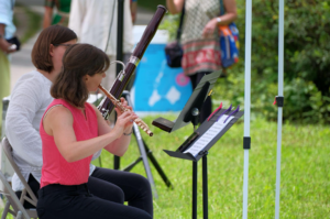 Spectators enjoy a flute performance by members of the Brookline Symphony Orchestra. Photo by Ashley D’Souza.